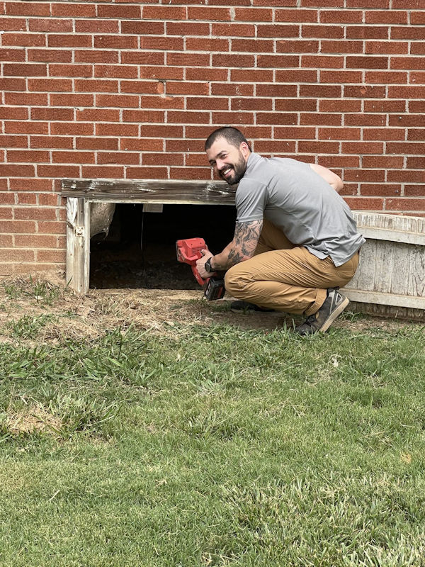 a WNC employee get excited to do a crawlspace inspection on a home in Western North Carolina of North Carolina.