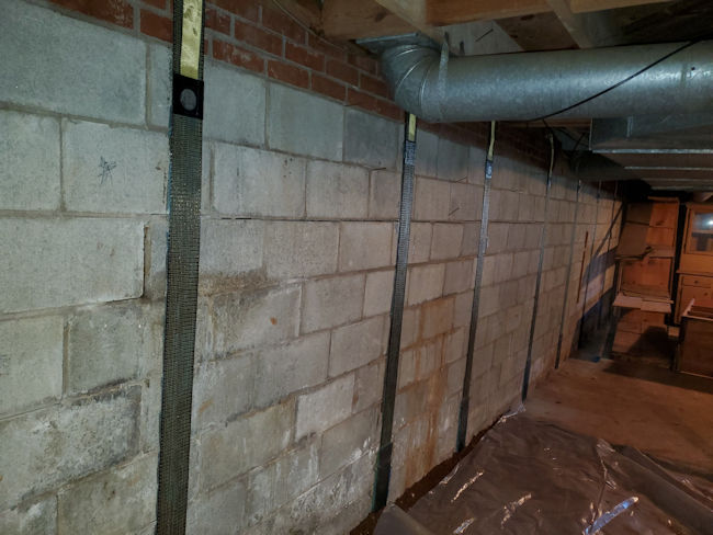carbon fiber wall straps, basement wall repair for a leaning or bowing wall on a home in Western North Carolina of North Carolina.