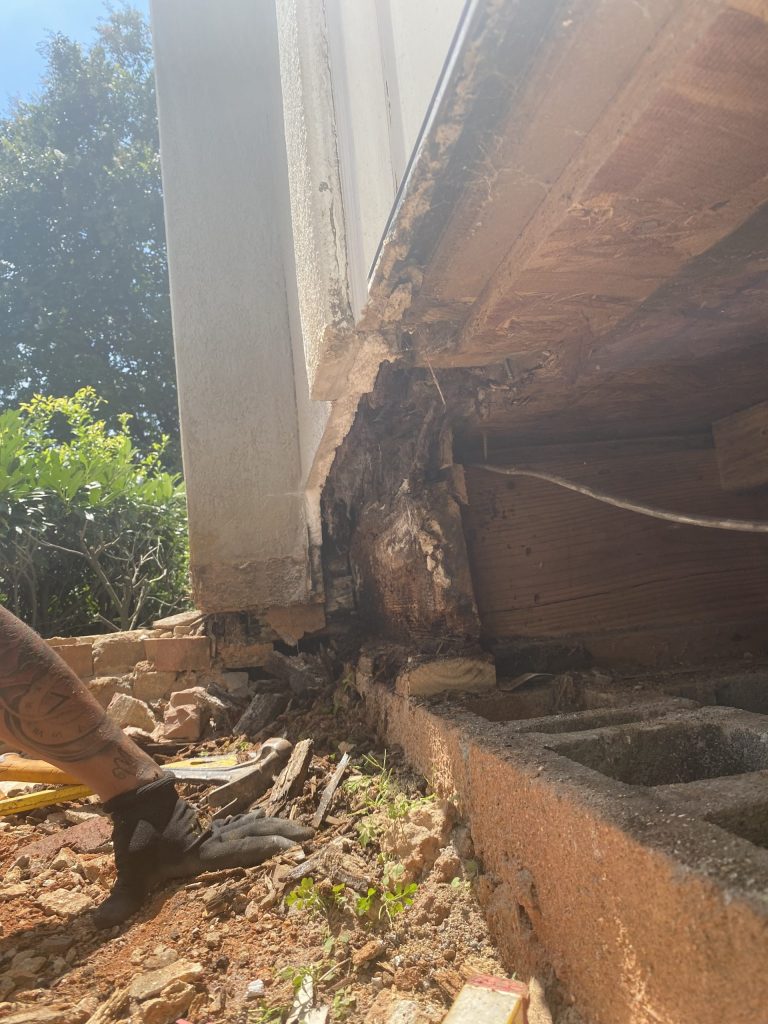 outside dry rot repair showing the whole band having been removed on a home in the upstate of North Carolina
