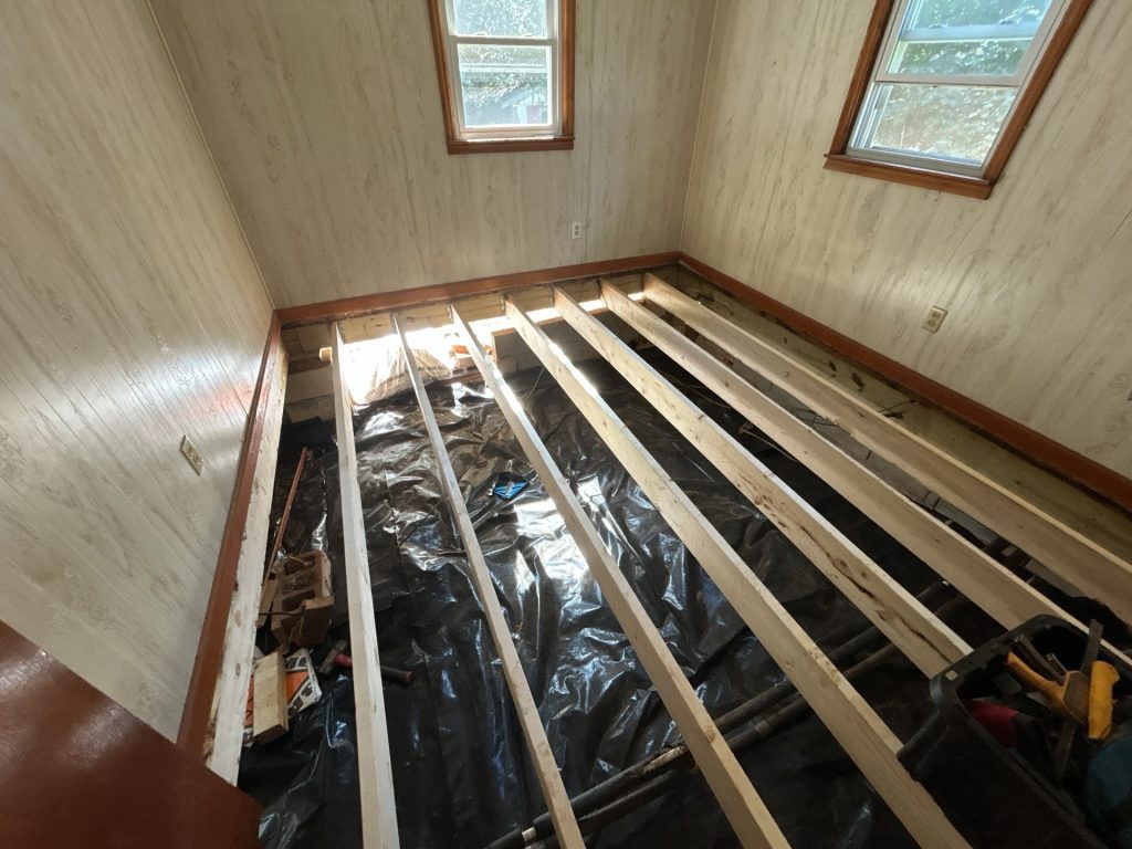 WNC band repair showing the whole floor being reframed on a home in Western North Carolina